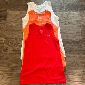 3 Nike Dri-Fit tops